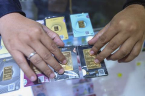 Emas Antam Terbang Tinggi! Ini Waktu Tepat Jual atau Beli?