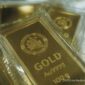Emas Tertekan: The Fed Bikin Harga Emas Goyah?